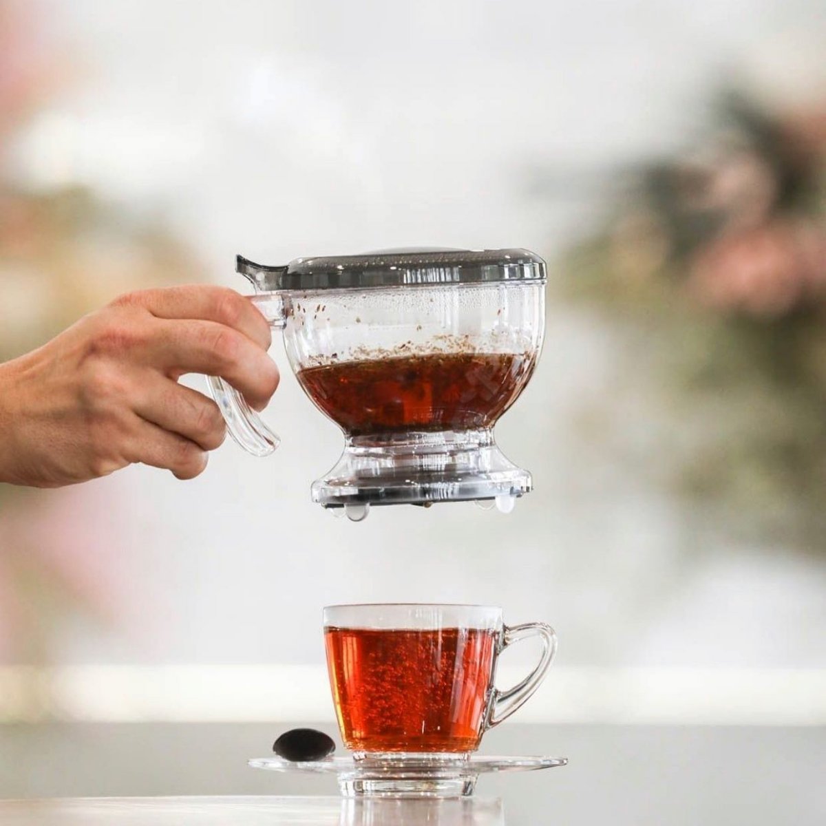 Gravity Teapot and a Cup & Saucer