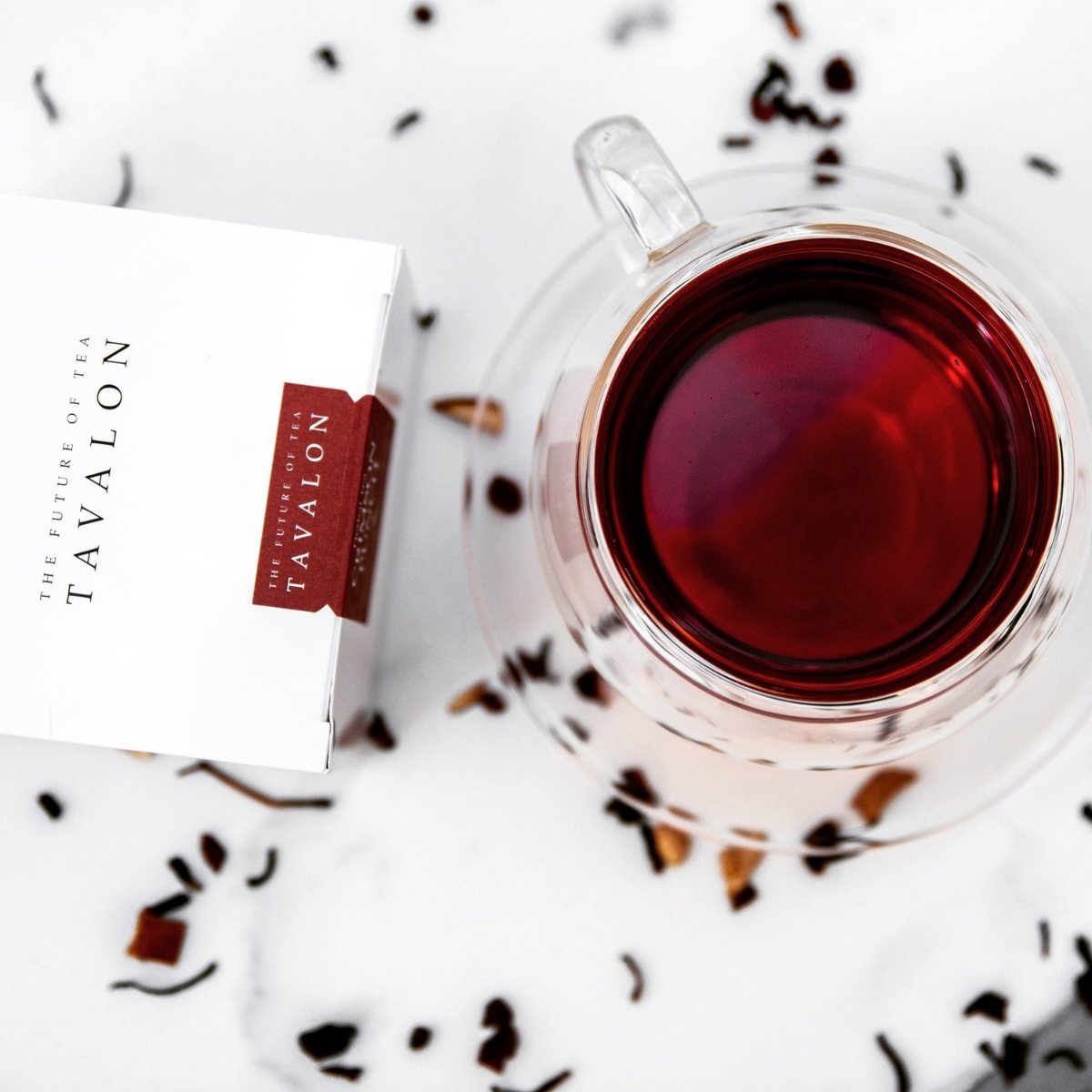 Tea Package & Brewed Tea in a Cup